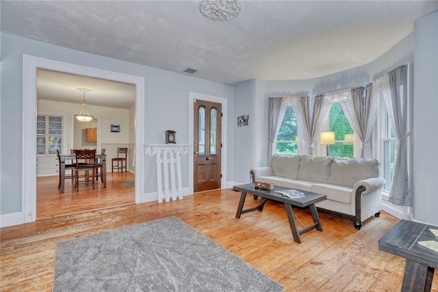 2360 Harris Rd, Palmyra, NY 14522 - living room with wood finished floors