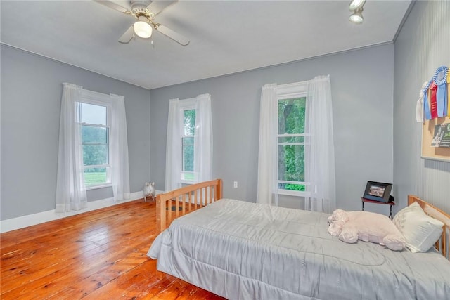 2360 Harris Rd, Palmyra, NY 14522 - bedroom featuring wood finished floors and ceiling fan