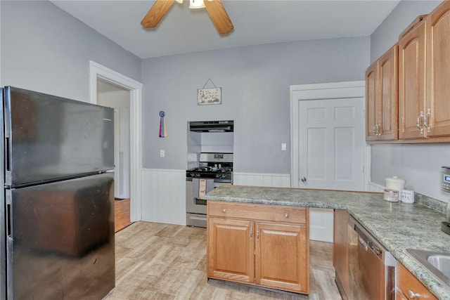 2360 Harris Rd, Palmyra, NY 14522 - kitchen with stainless steel appliances, light wood-style flooring, wainscoting, a ceiling fan, and ventilation hood