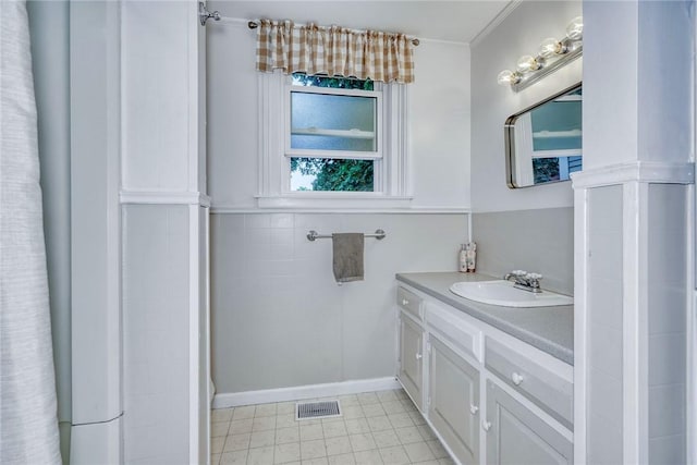 2360 Harris Rd, Palmyra, NY 14522 - bathroom with vanity, tile patterned flooring, and crown molding