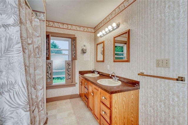2360 Harris Rd, Palmyra, NY 14522 - bathroom with wallpapered walls and double vanity