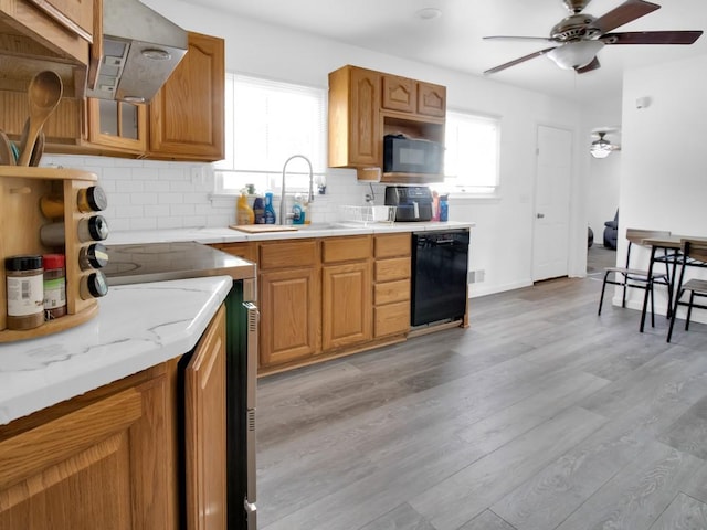 449 Pinnacle Rd, Henrietta, NY 14623 - kitchen featuring black appliances, ceiling fan, backsplash, and healthy amount of natural light