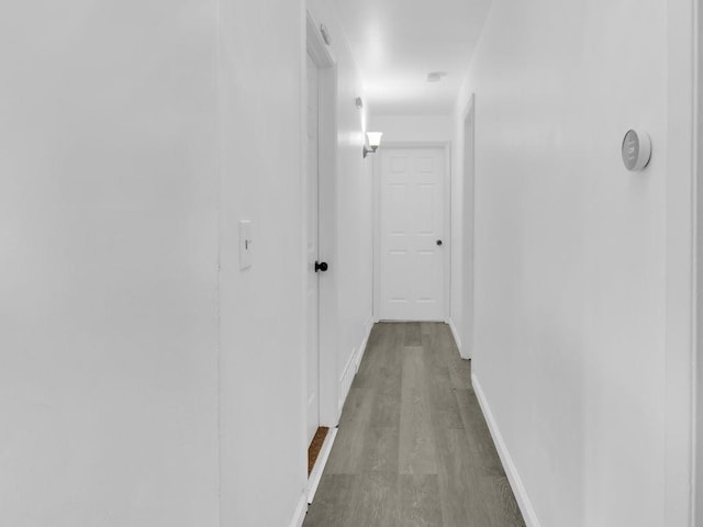 449 Pinnacle Rd, Henrietta, NY 14623 - hall with wood finished floors and baseboards