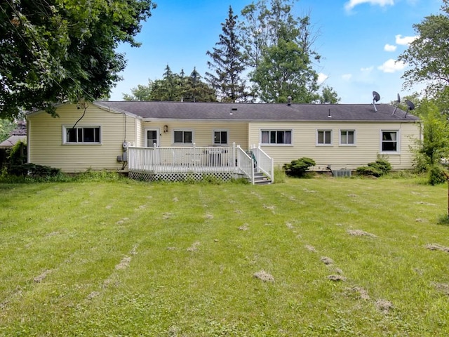 449 Pinnacle Rd, Henrietta, NY 14623 - back of property featuring a wooden deck and a lawn
