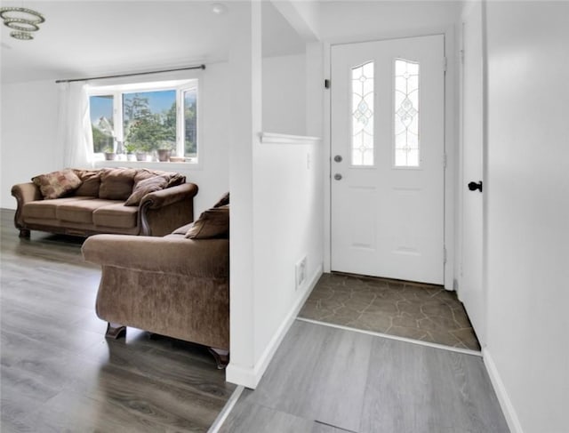 449 Pinnacle Rd, Henrietta, NY 14623 - entrance foyer featuring wood finished floors and plenty of natural light