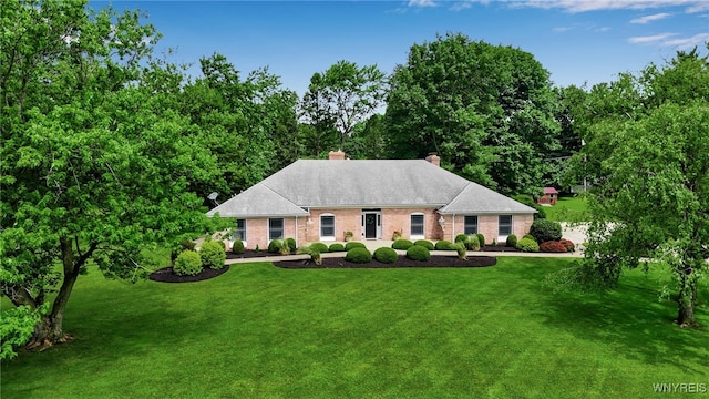 4901 Pineledge Dr W, Clarence, NY 14031 - view of front facade with a front yard, a chimney, and brick siding