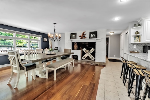 4901 Pineledge Dr W, Clarence, NY 14031 - dining area with a chandelier, light tile patterned floors, and recessed lighting