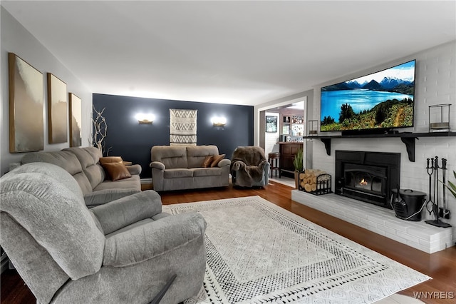 4901 Pineledge Dr W, Clarence, NY 14031 - living area with wood finished floors and a fireplace