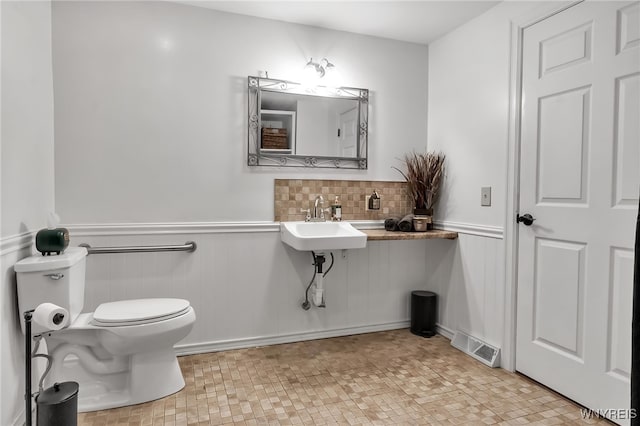 4901 Pineledge Dr W, Clarence, NY 14031 - bathroom with a wainscoted wall and toilet