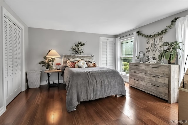 4901 Pineledge Dr W, Clarence, NY 14031 - bedroom featuring dark wood-style flooring and baseboards