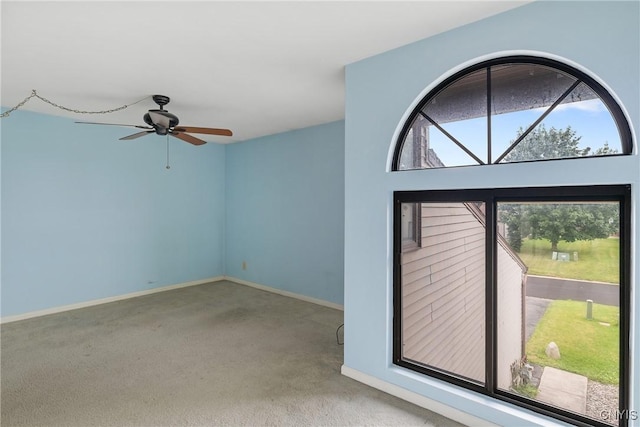 8493 Bubbling Springs Dr, Clay, NY 13027 - carpeted spare room with ceiling fan and baseboards