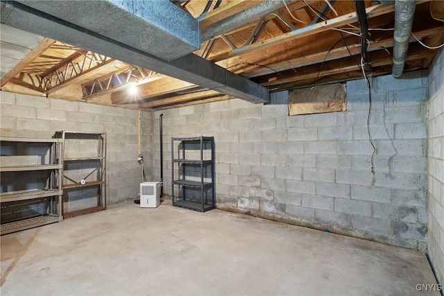 8493 Bubbling Springs Dr, Clay, NY 13027 - unfinished below grade area with concrete block wall
