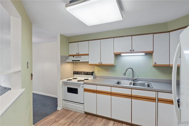 8493 Bubbling Springs Dr, Clay, NY 13027 - kitchen with white appliances, under cabinet range hood, light wood finished floors, light countertops, and white cabinetry