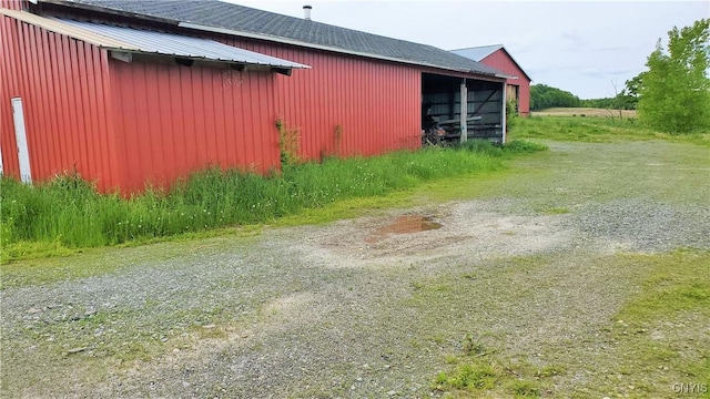 14183 State Route 90, Summerhill, NY 13092 - view of property exterior featuring a pole building and an outdoor structure