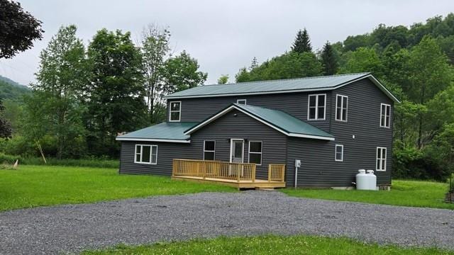 27 Watson Farm Rd, Summit, PA 16720 - back of house featuring a deck and a lawn