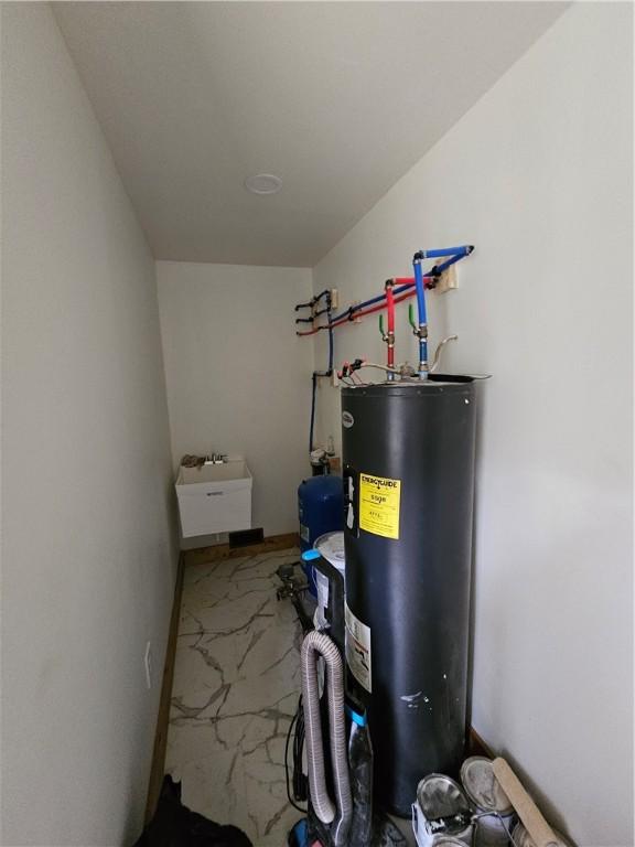 27 Watson Farm Rd, Summit, PA 16720 - utility room featuring water heater