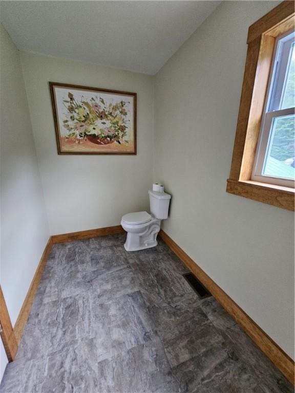 27 Watson Farm Rd, Summit, PA 16720 - half bathroom featuring toilet and baseboards