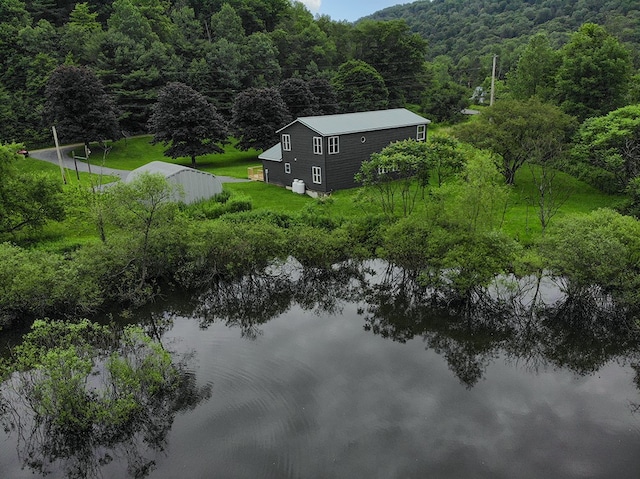27 Watson Farm Rd, Summit, PA 16720 - view from above of property with a heavily wooded area and a nearby body of water