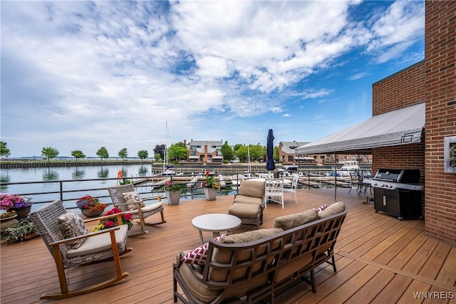 176 Rivermist Dr, Buffalo, NY 14202 - deck featuring a water view, grilling area, and an outdoor living space
