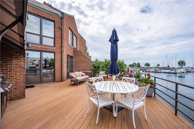 176 Rivermist Dr, Buffalo, NY 14202 - wooden terrace featuring a water view and outdoor dining space