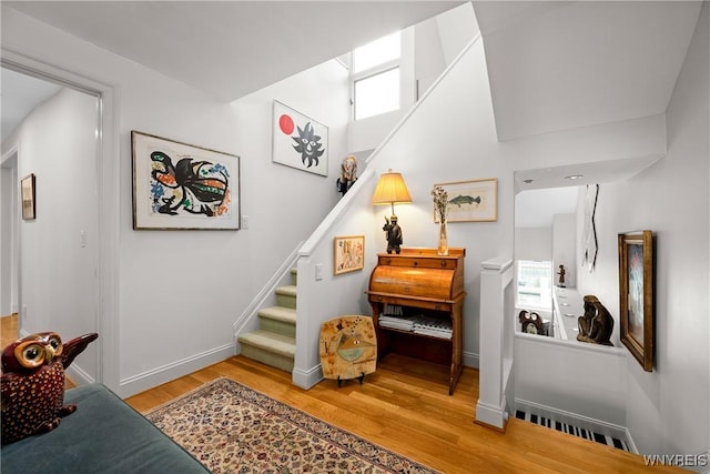 176 Rivermist Dr, Buffalo, NY 14202 - stairs with wood finished floors and baseboards