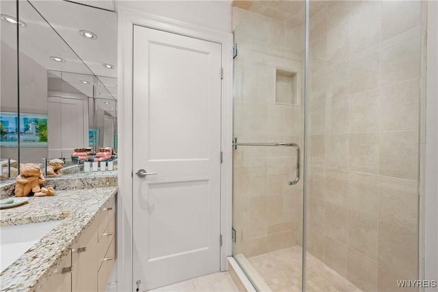 176 Rivermist Dr, Buffalo, NY 14202 - bathroom featuring a shower stall, vanity, recessed lighting, and tile patterned floors