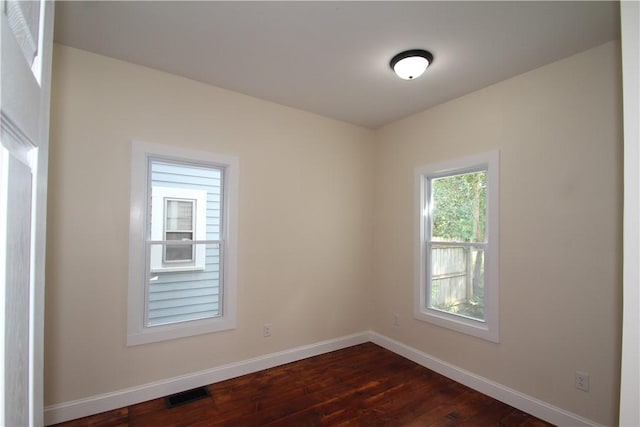 38 Spring St, Sweden, NY 14420 - spare room with baseboards and dark wood-style floors