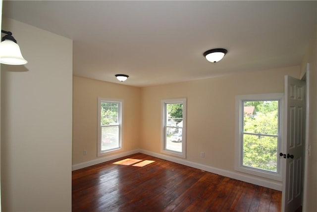 38 Spring St, Sweden, NY 14420 - unfurnished room with baseboards and dark wood-style floors