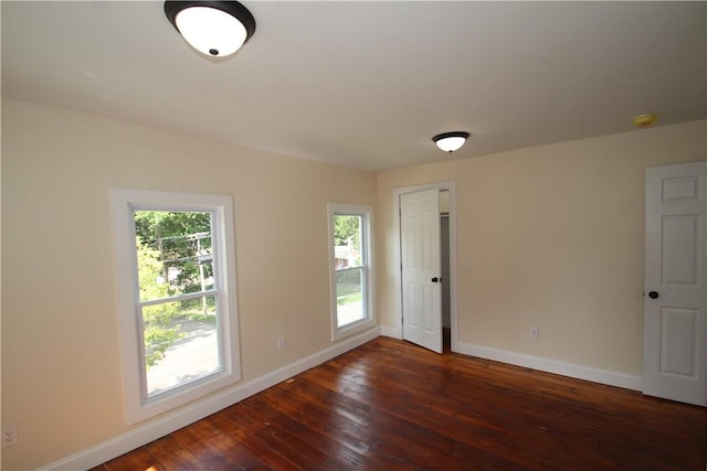 38 Spring St, Sweden, NY 14420 - spare room with dark wood finished floors and a smoke detector