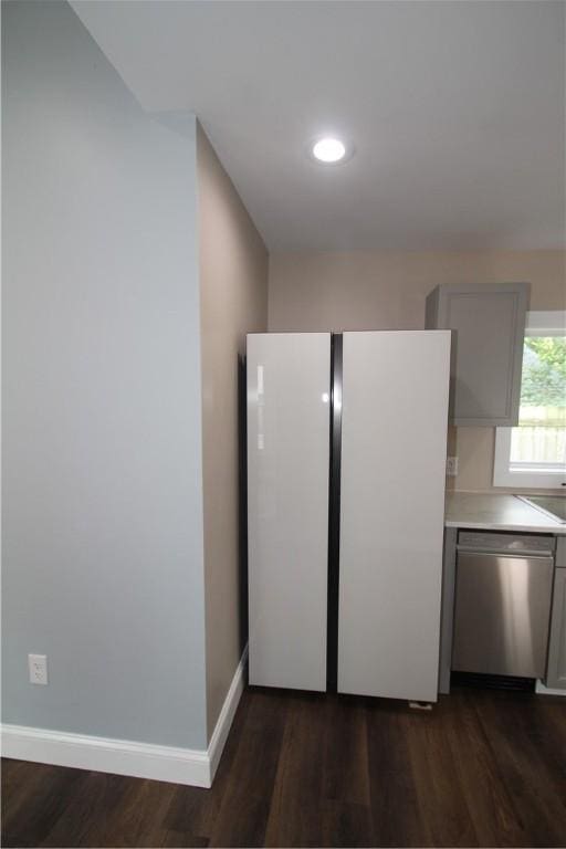 38 Spring St, Sweden, NY 14420 - kitchen featuring stainless steel dishwasher, freestanding refrigerator, dark wood finished floors, light countertops, and recessed lighting