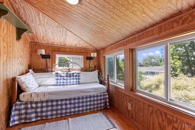 6 Union St, Cazenovia, NY 13035 - bedroom with wooden walls, wood finished floors, vaulted ceiling, and wooden ceiling