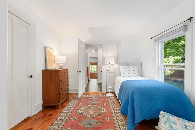 6 Union St, Cazenovia, NY 13035 - bedroom featuring light wood-type flooring and multiple windows