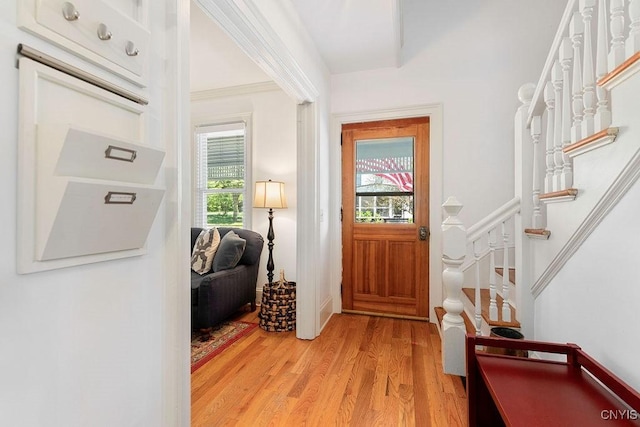6 Union St, Cazenovia, NY 13035 - foyer featuring light wood-style floors and stairs