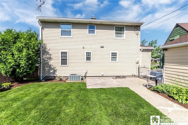 19 Darwin Dr, Lancaster, NY 14043 - rear view of house with a yard and a patio