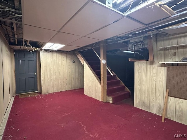 5249 State Route 21, Alfred, NY 14803 - basement with stairway, wooden walls, and carpet floors