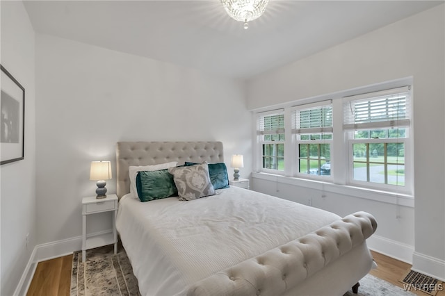 6862 Lake Shore Rd, Evans, NY 14047 - bedroom featuring wood finished floors