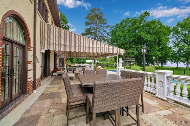6862 Lake Shore Rd, Evans, NY 14047 - view of patio featuring french doors and outdoor dining area