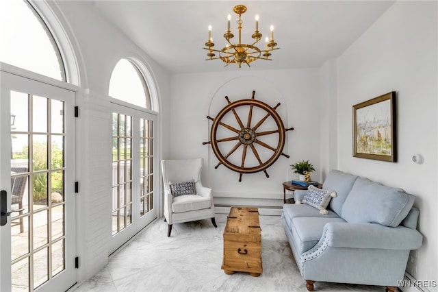 6862 Lake Shore Rd, Evans, NY 14047 - living area featuring a chandelier, light marble finish floors, and a baseboard radiator