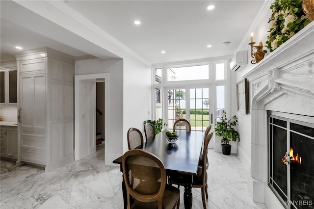 6862 Lake Shore Rd, Evans, NY 14047 - dining room featuring crown molding, recessed lighting, a high end fireplace, a wall unit AC, and light marble finish floors