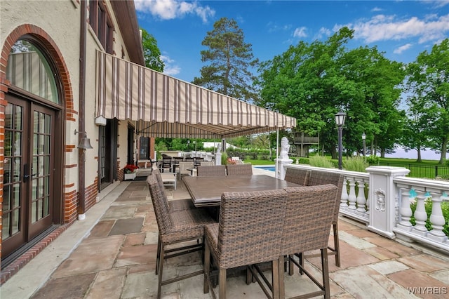 6862 Lake Shore Rd, Evans, NY 14047 - view of patio featuring french doors and outdoor dining area