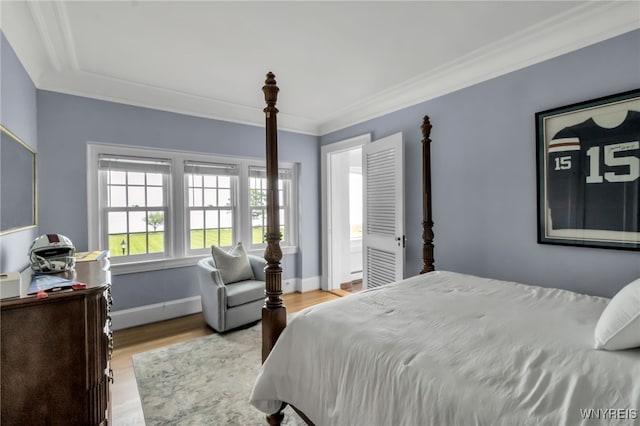 6862 Lake Shore Rd, Evans, NY 14047 - bedroom featuring wood finished floors and ornamental molding