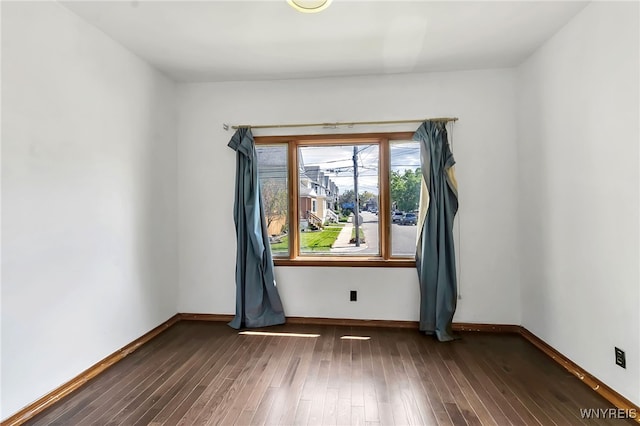 20 Rejtan St, Buffalo, NY 14206 - empty room with dark wood-type flooring