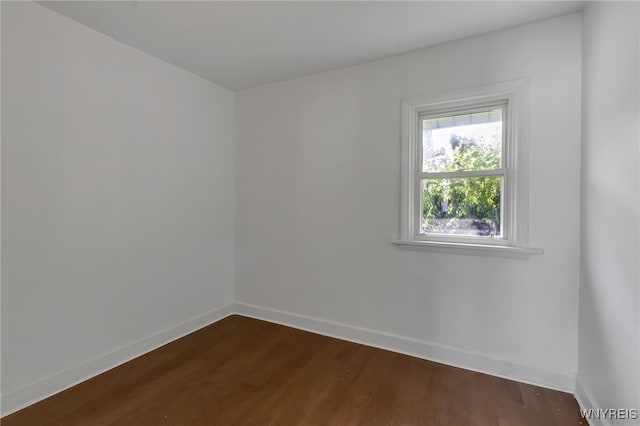 20 Rejtan St, Buffalo, NY 14206 - empty room featuring baseboards and dark wood-type flooring