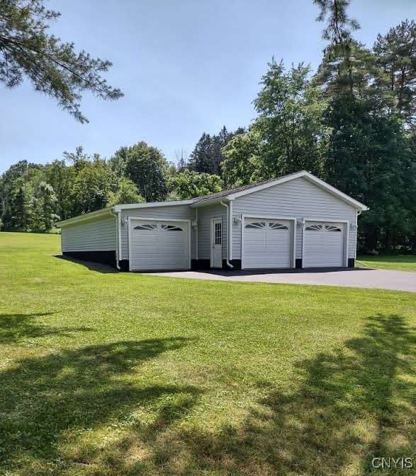 7408 Rome Oriskany Rd, Rome, NY 13440 - detached garage featuring view of scattered trees