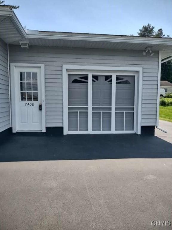 7408 Rome Oriskany Rd, Rome, NY 13440 - property entrance with a garage