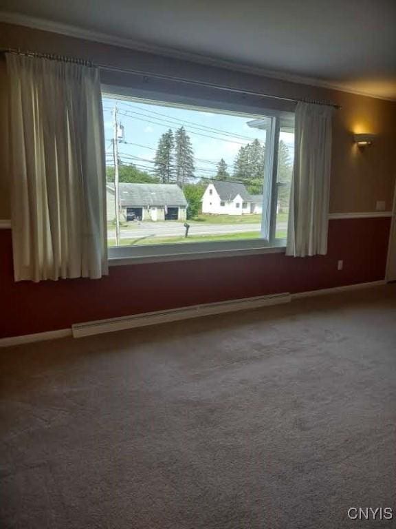 7408 Rome Oriskany Rd, Rome, NY 13440 - carpeted spare room with crown molding and a baseboard heating unit