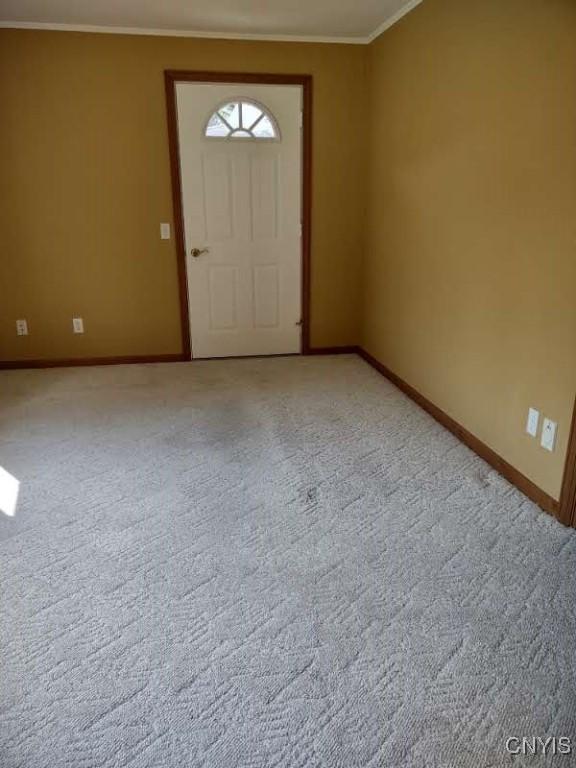 7408 Rome Oriskany Rd, Rome, NY 13440 - foyer entrance with crown molding and light colored carpet