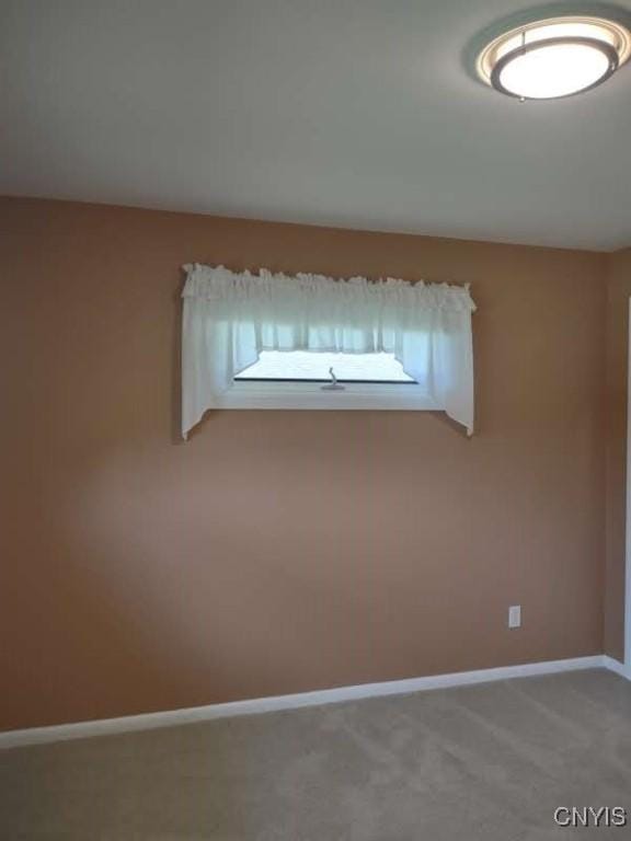 7408 Rome Oriskany Rd, Rome, NY 13440 - empty room featuring light colored carpet and baseboards
