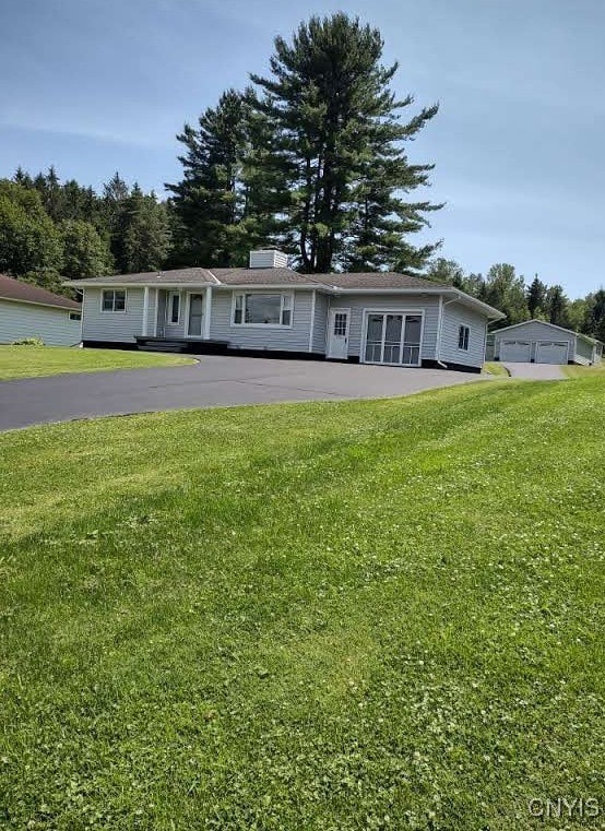 7408 Rome Oriskany Rd, Rome, NY 13440 - ranch-style house featuring a front yard and a chimney