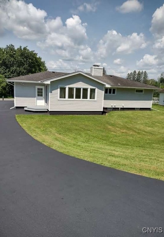 7408 Rome Oriskany Rd, Rome, NY 13440 - view of front of home with a front lawn